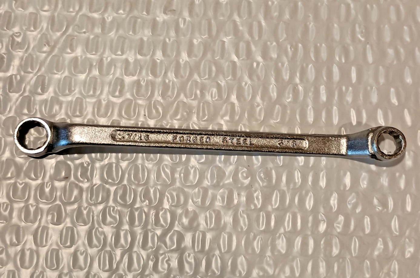 3/8 x 7/16″ DOUBLE BOX WRENCH, 6.8″ LONG, OFFSET, 12 POINT, UNBRANDED.