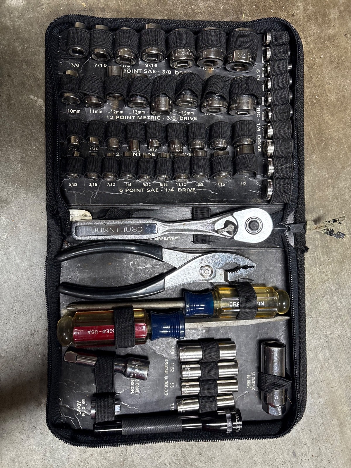 Sears Craftsman 55-piece mechanics tool set and a MAGLITE