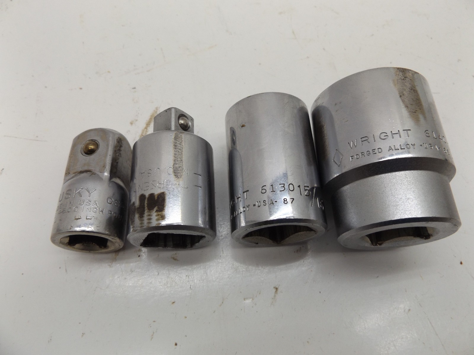 Wright 1-1/4″ & 15/16″ sockets 3/4″ dr Huskey 1/2″-3/4″ Thorsen 3/4 to 1/2″ 4pcs