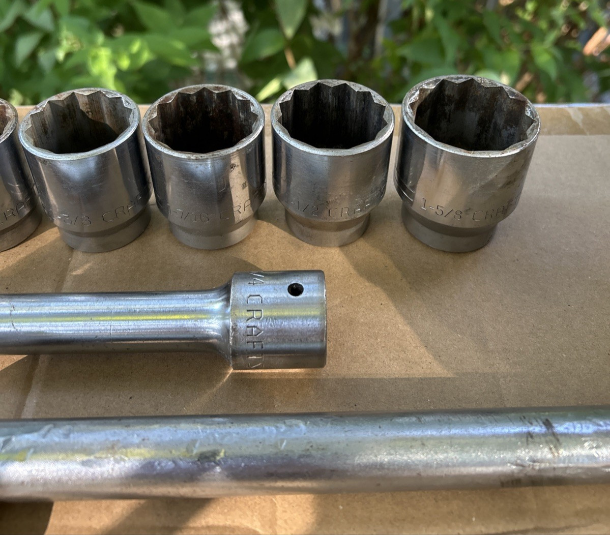 (9) CRAFTSMAN V SERIES 3/4” DRIVE SOCKETS- 18″ SLIDING BREAKER and 8″ EXTENSION.