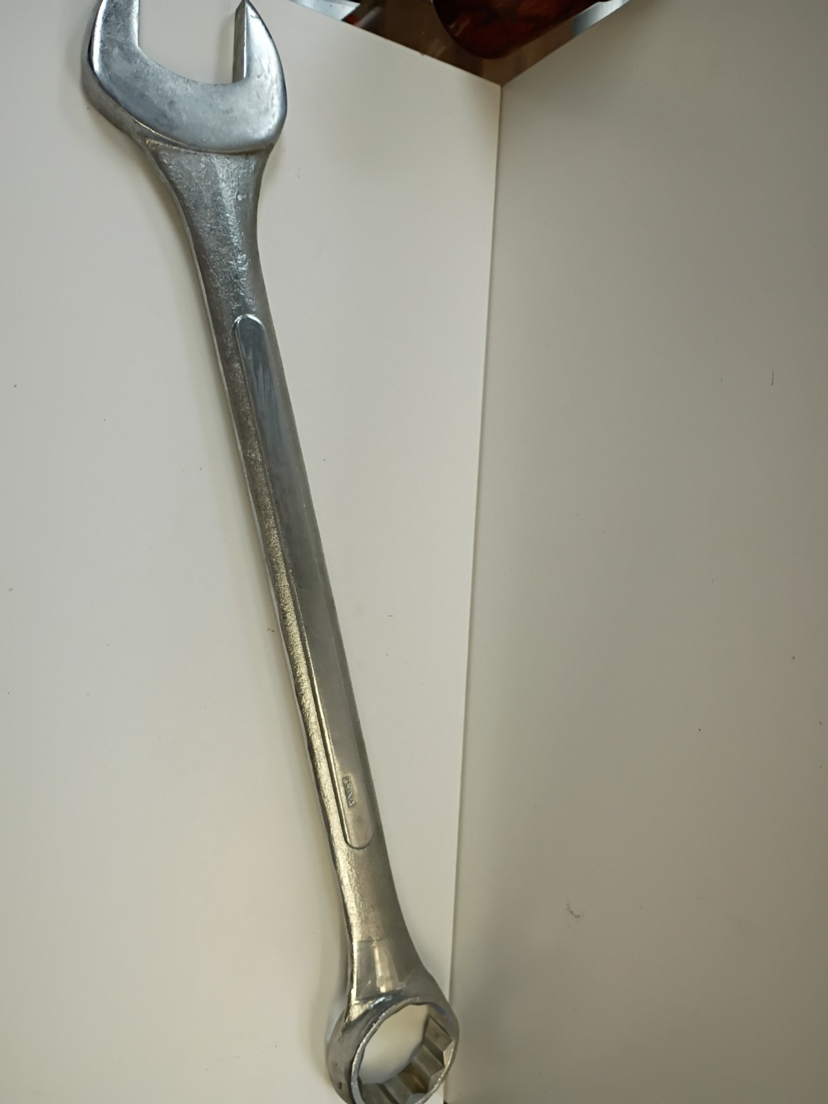 2-inch combination wrench featuring an open end and a 12-point box end