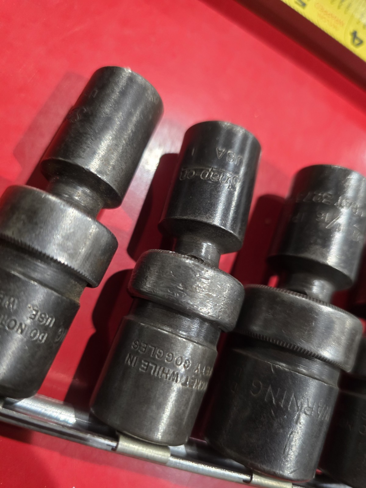 SNAP ON 1/2 DRIVE UNIVERSAL SWIVEL IMPACTS IN SAE. 4 PIECE SET WITH BONUS DEEP