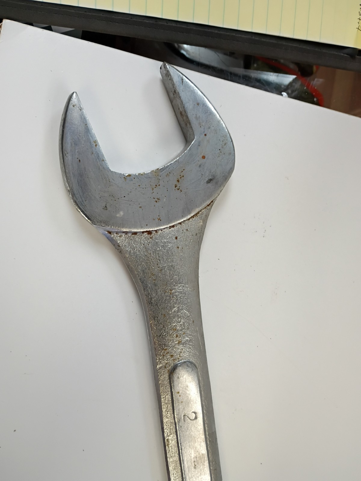 2-inch combination wrench featuring an open end and a 12-point box end