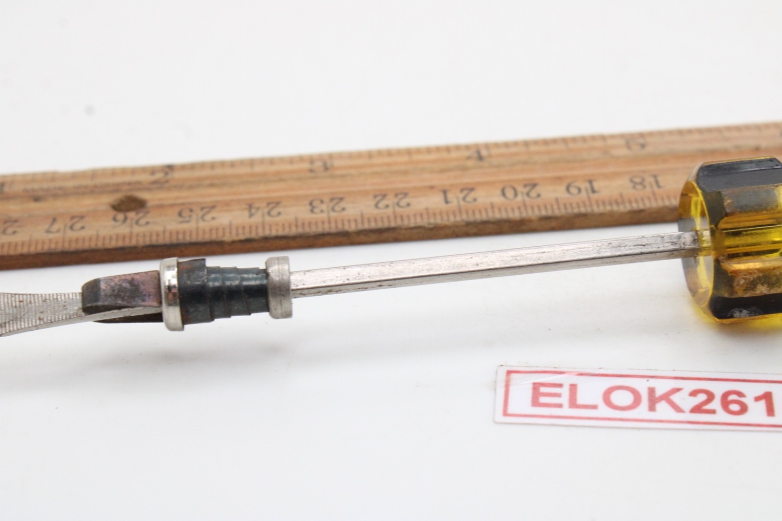 Great Neck Hard Amber/Black Handle Holding Slotted Flat Screwdriver
