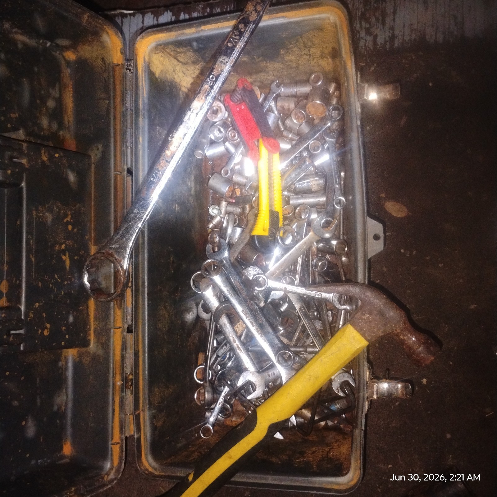 vintage old tool box with random Mechanics tools.