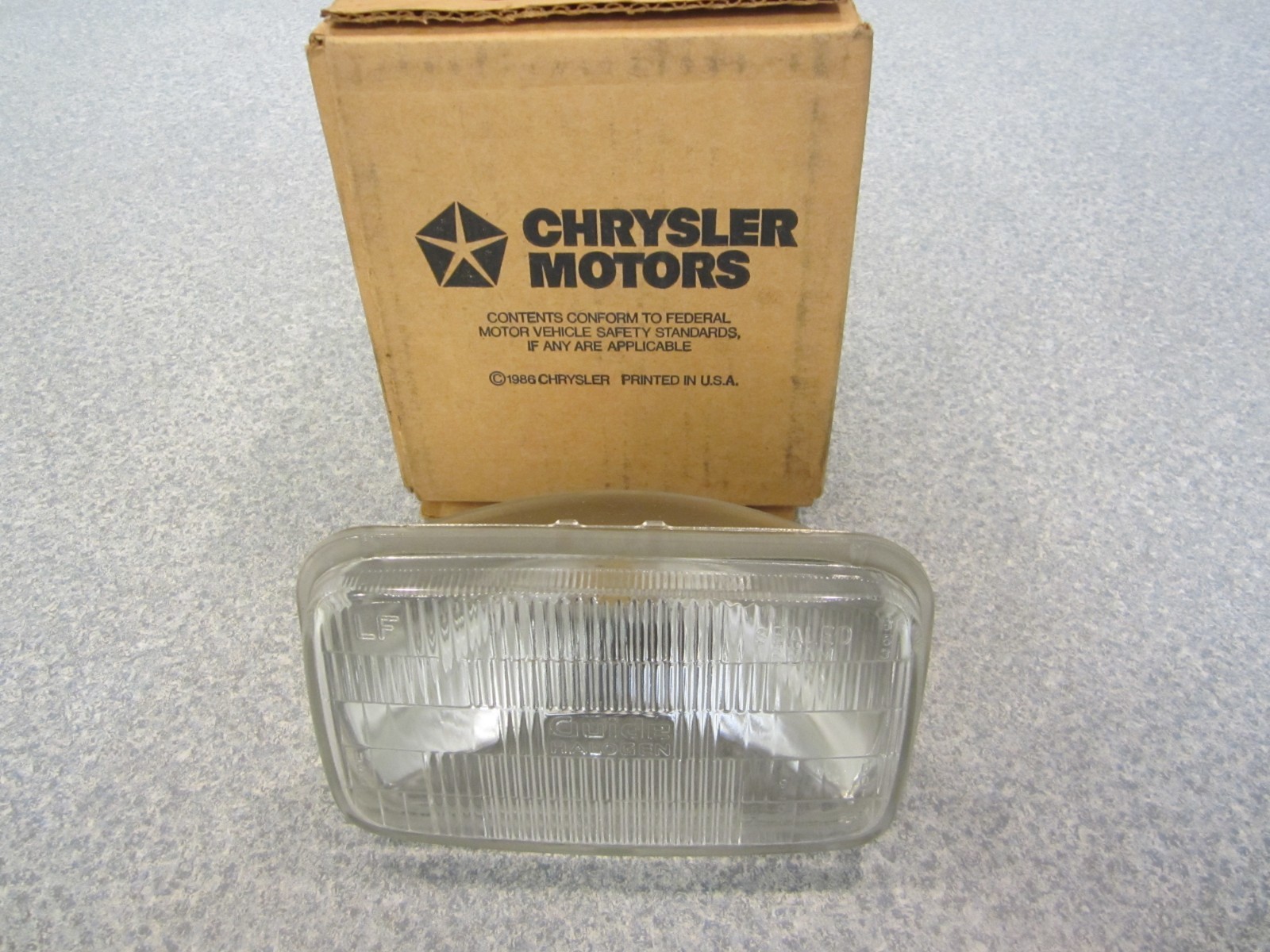 NOS Mopar 4451025 Low Beam Head Lamp Bulb 1991-1993 Chrysler Imperial