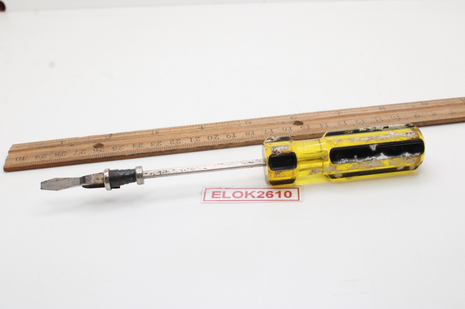 Great Neck Hard Amber/Black Handle Holding Slotted Flat Screwdriver