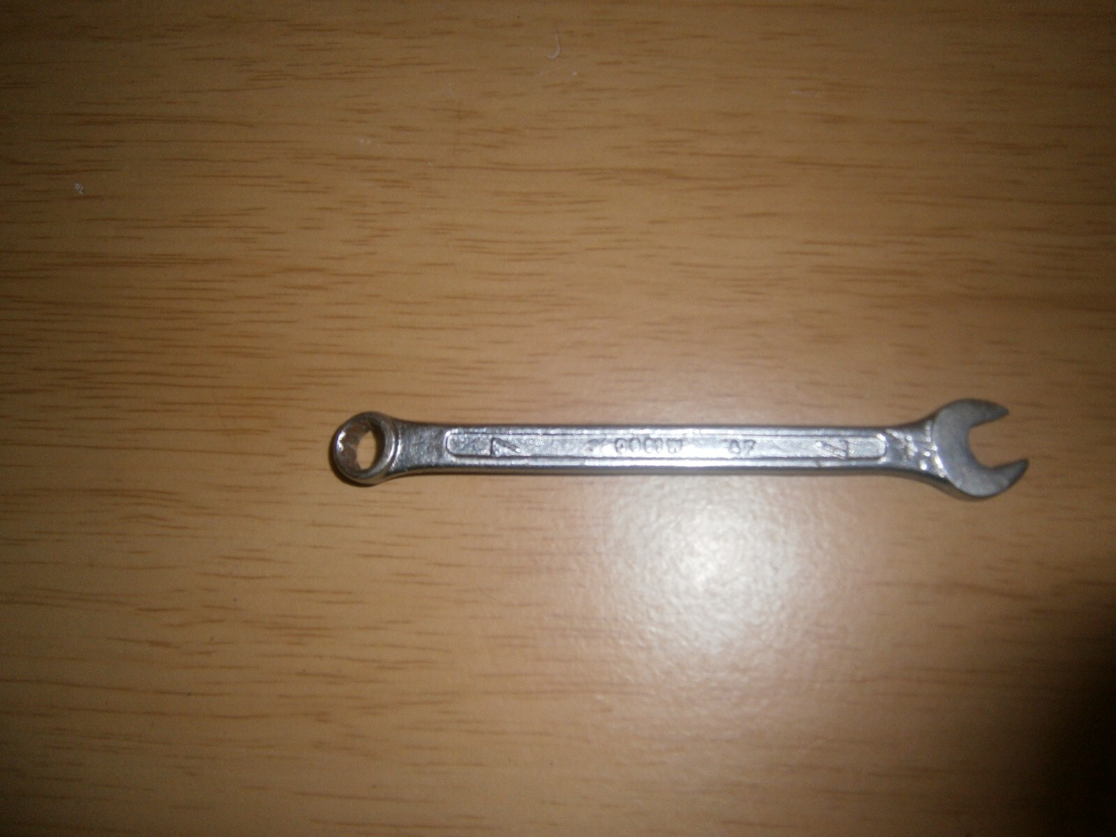 Vintage silver tone spanner. 7mm both ends.(E6c)