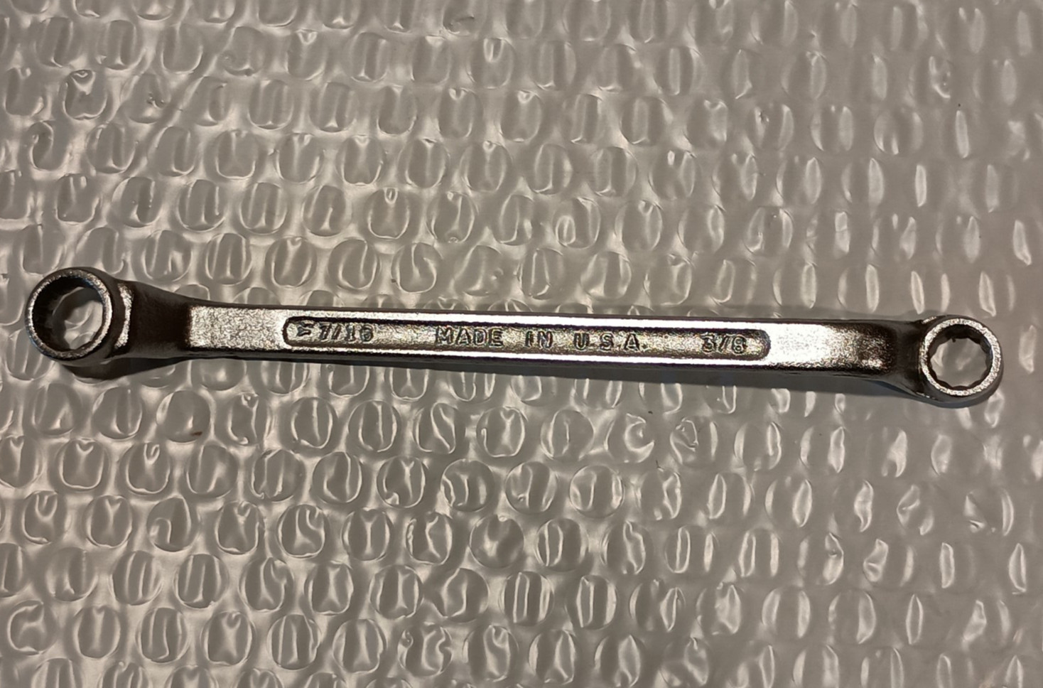 3/8 x 7/16″ DOUBLE BOX WRENCH, 6.8″ LONG, OFFSET, 12 POINT, UNBRANDED.