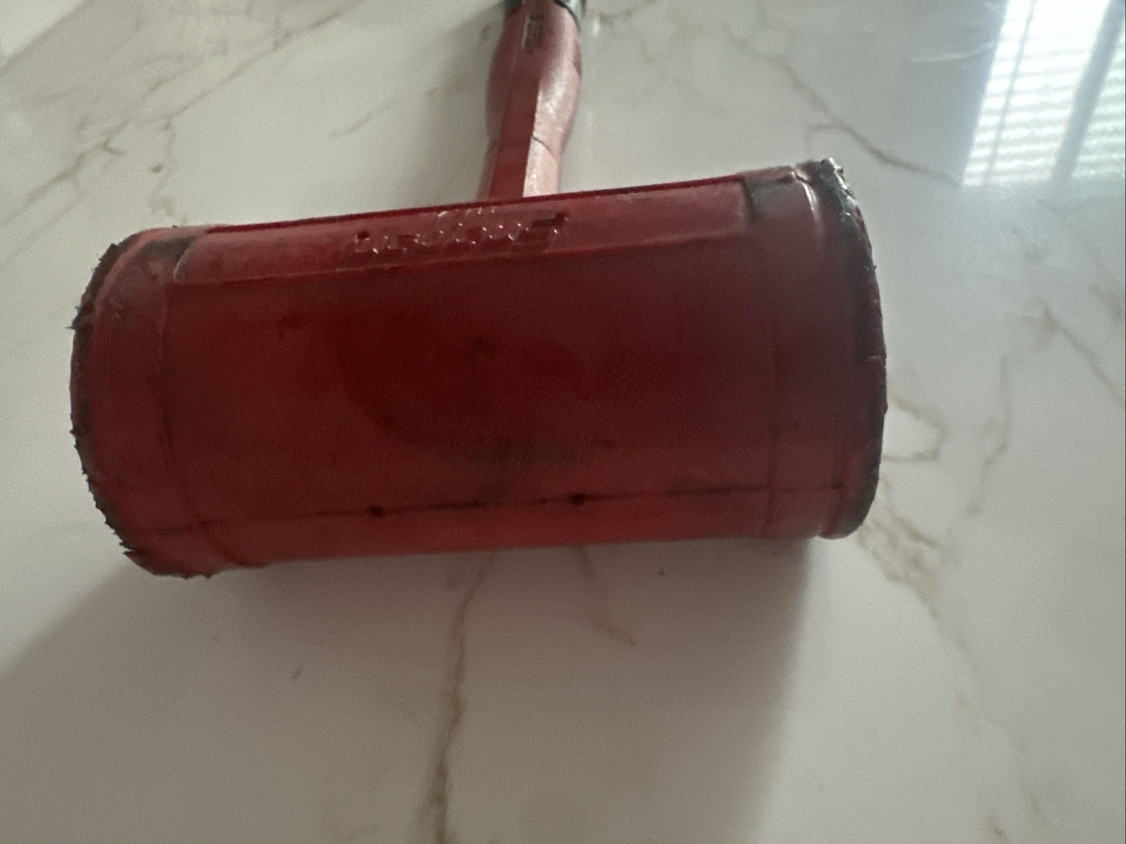 Snap ON 56oz dead blow hammer. Red with soft grip handle.
