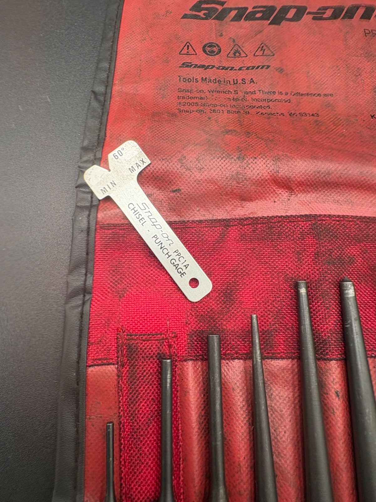 snap on 11pc punch and chisel set in soft roll case (some wear)