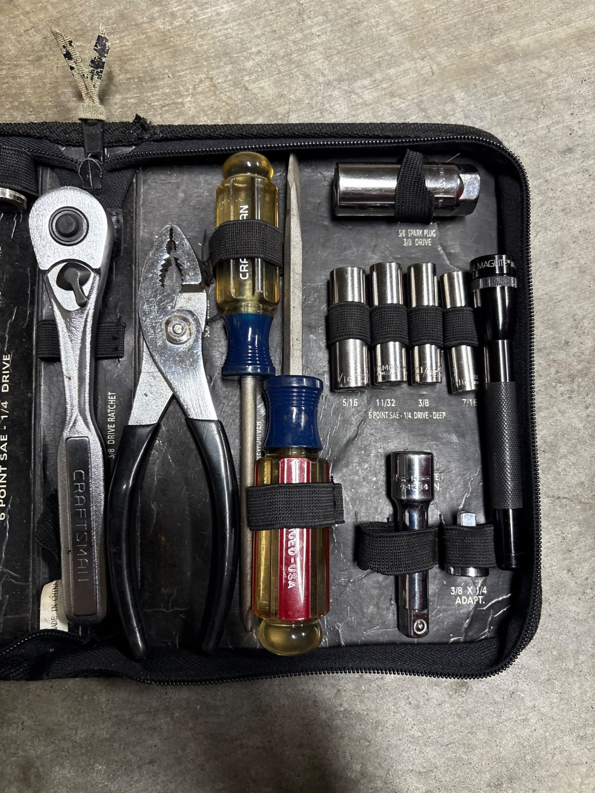 Sears Craftsman 55-piece mechanics tool set and a MAGLITE