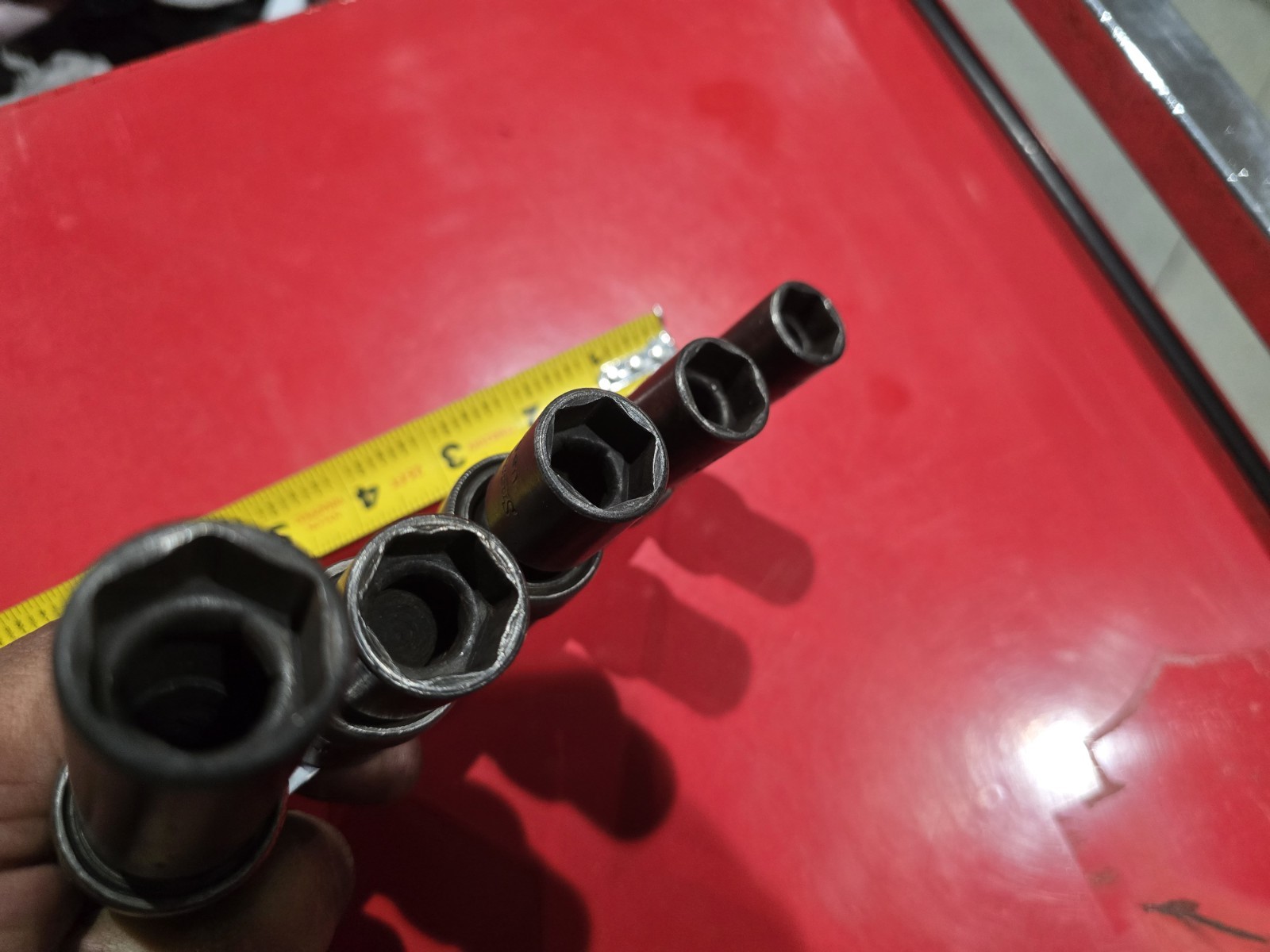 SNAP ON 1/2 DRIVE UNIVERSAL SWIVEL IMPACTS IN SAE. 4 PIECE SET WITH BONUS DEEP