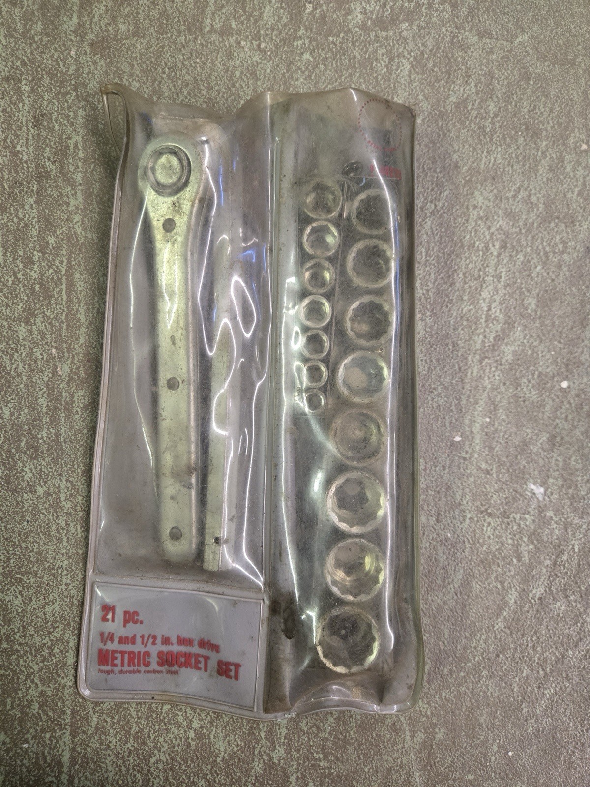 vintage 21-piece Sears metric socket set. both 1/4 inch and 1/2 inch hex drives.