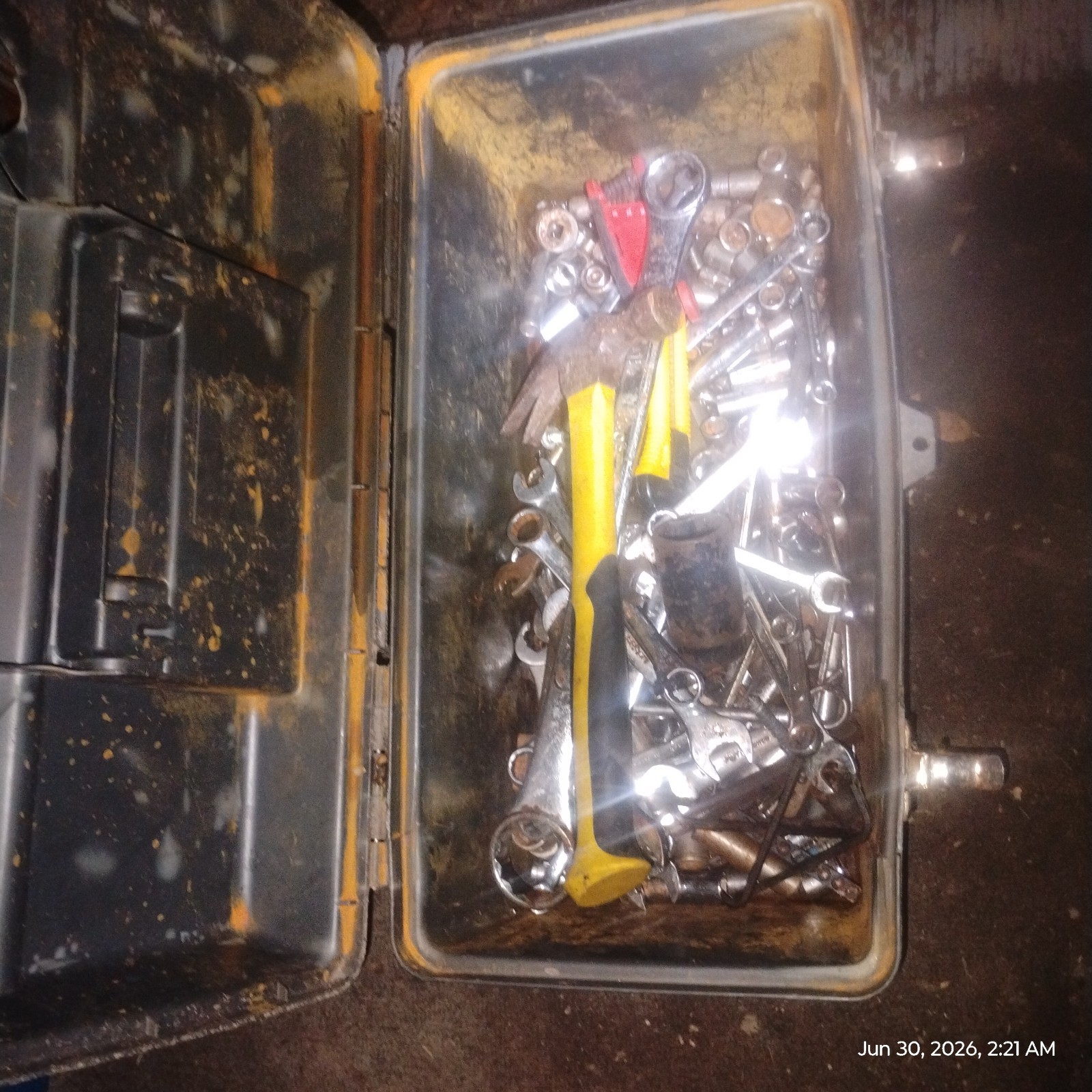 vintage old tool box with random Mechanics tools.