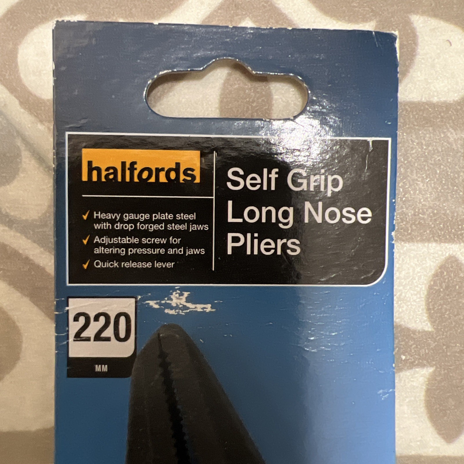 Halfords Self Grip Long Nose Pliers. 220mm long. 70mm Jaw Opening. Adj screw.