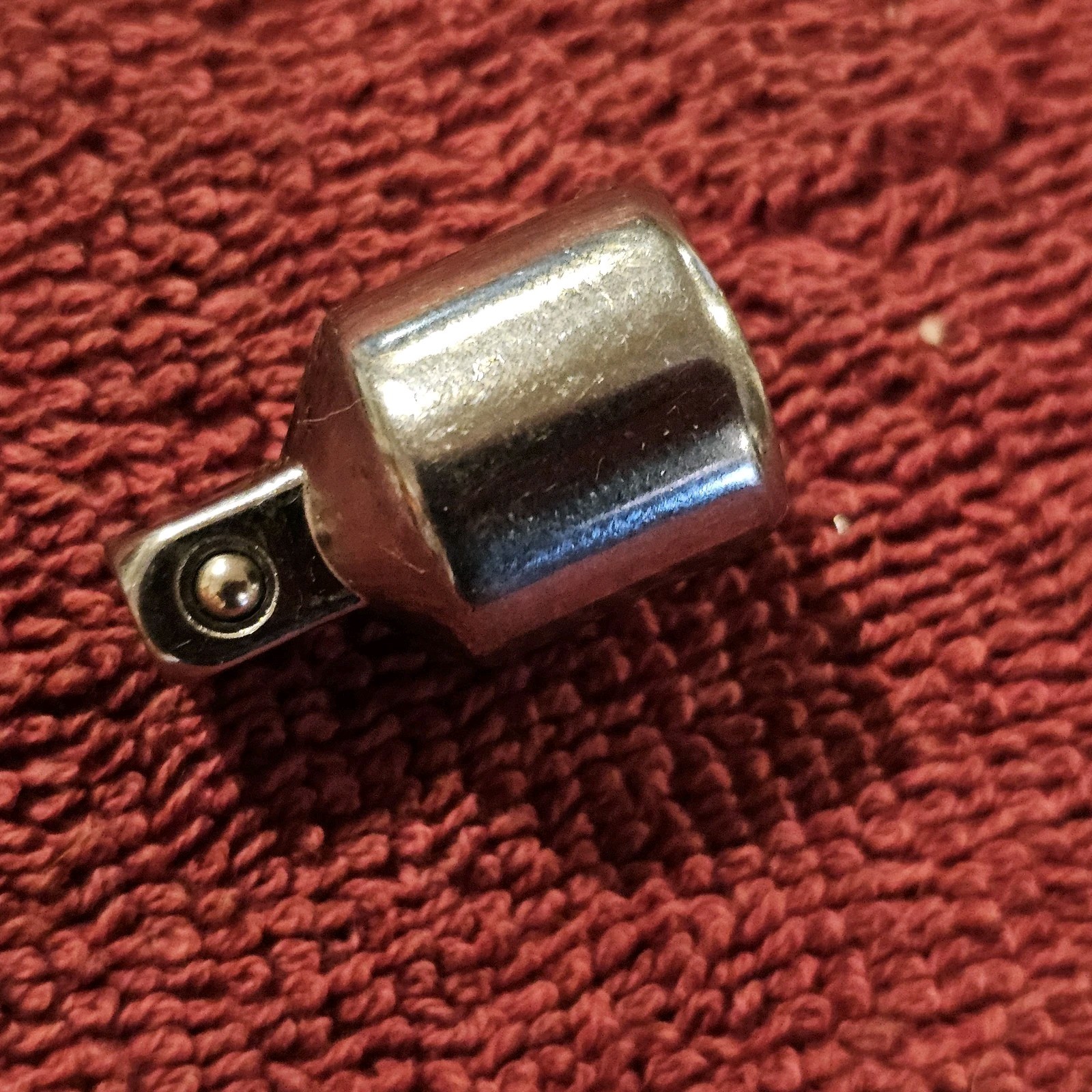 Unmarked 3/8″F to 1/4″ Male Dr. Reducer Adapter