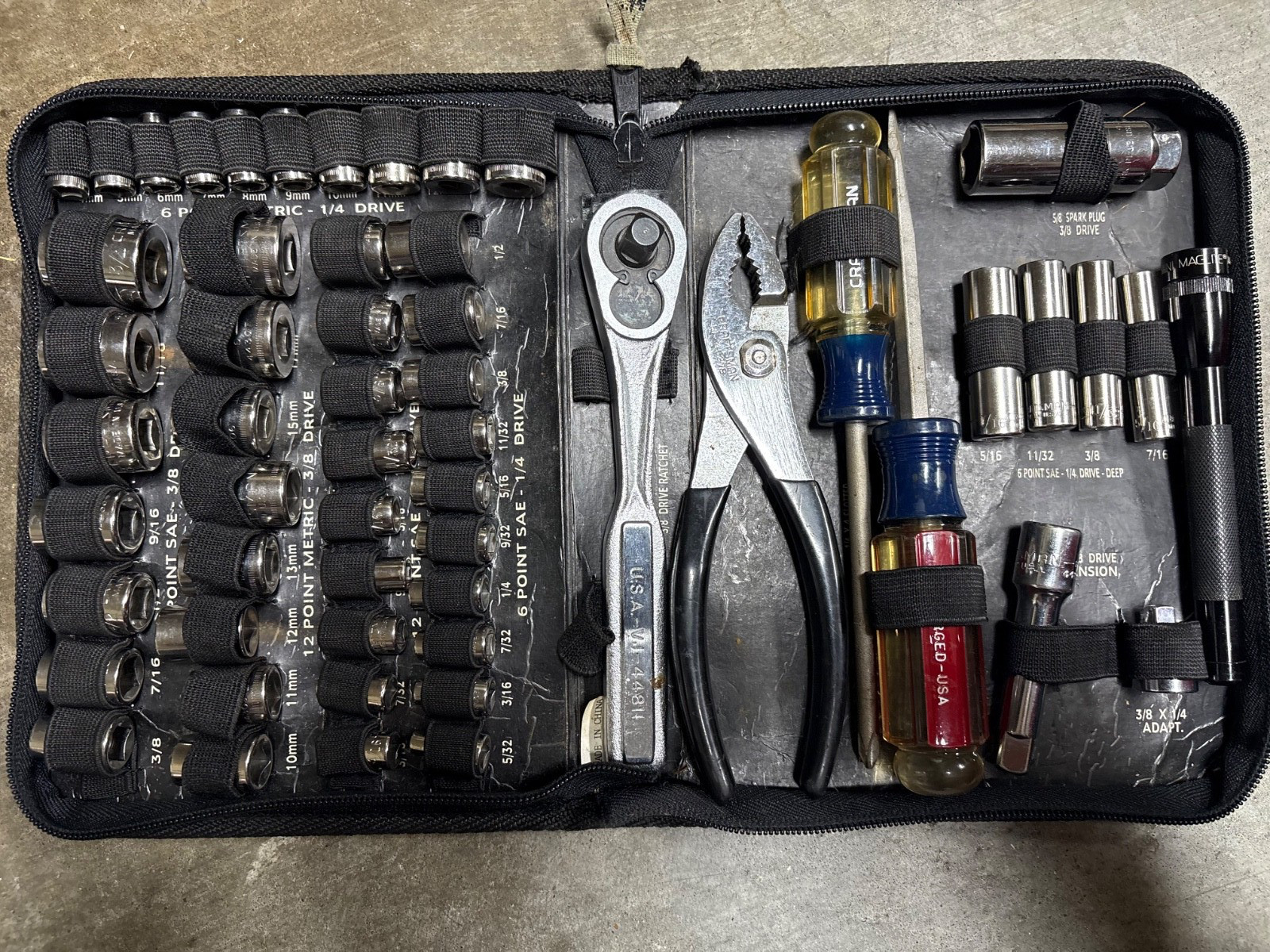 Sears Craftsman 55-piece mechanics tool set and a MAGLITE