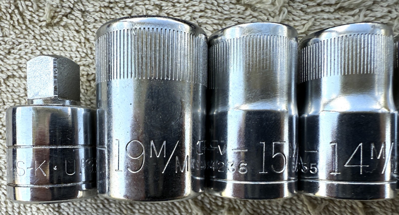 LOT OF 8, 1/2 INCH DRIVE SOCKETS AS PICTURES AND DESCRIBED