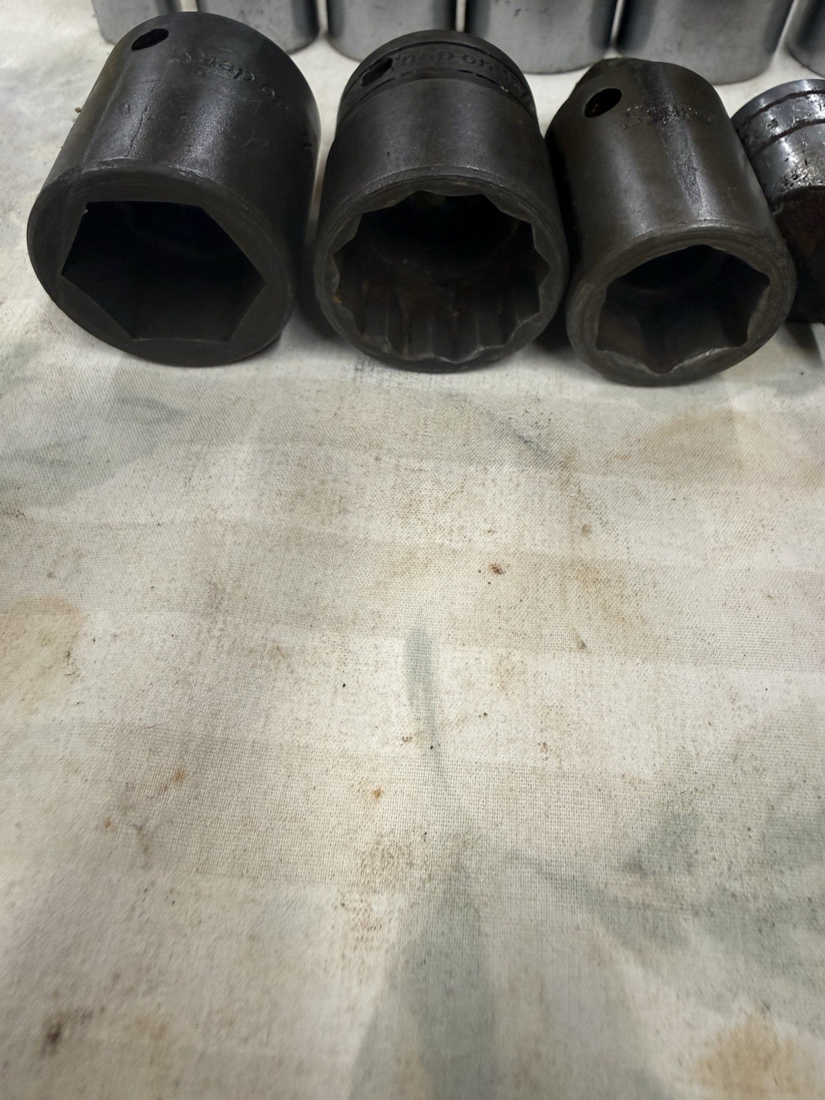 Snap On Sockets And 3/8” 11” Extension. 7—1/2” Drive Deep, 3—1/2” Drive Impact