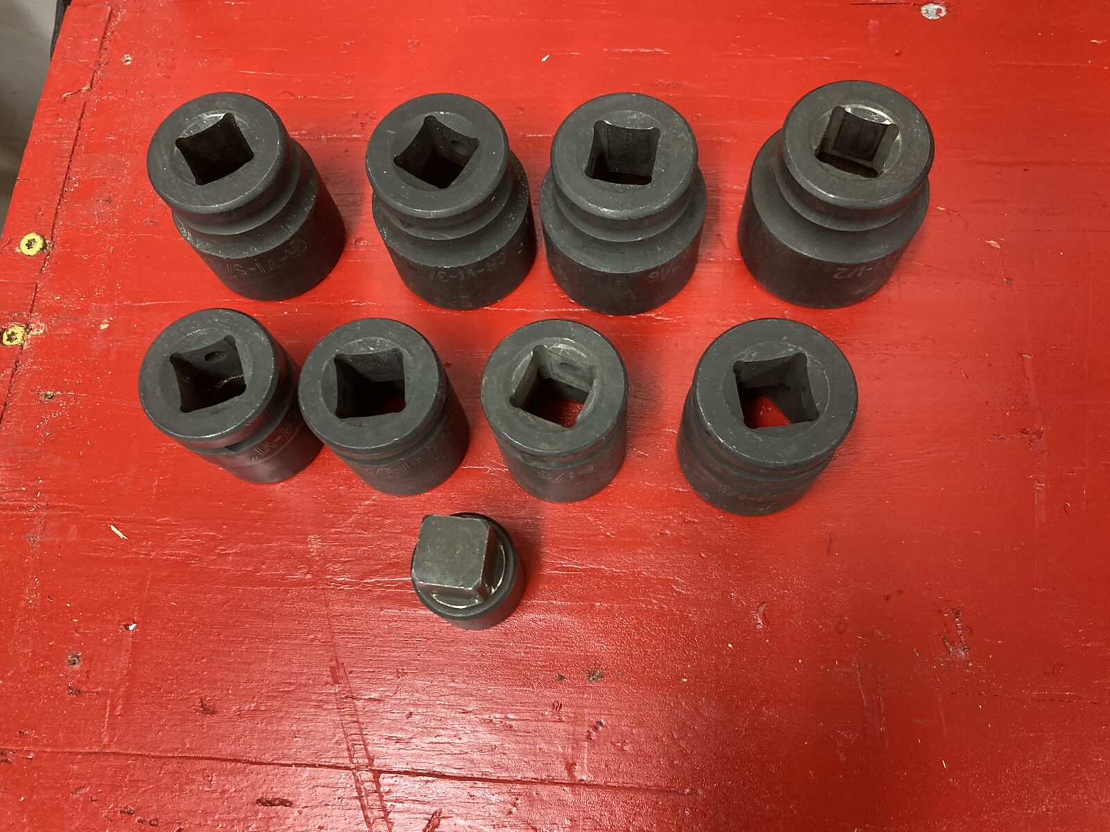 EIGHT 3/4 DRIVE STANDARD IMPACT SOCKETS . 1 IN THRU 1 1/2 IN WITH 1/2 ADAPTER