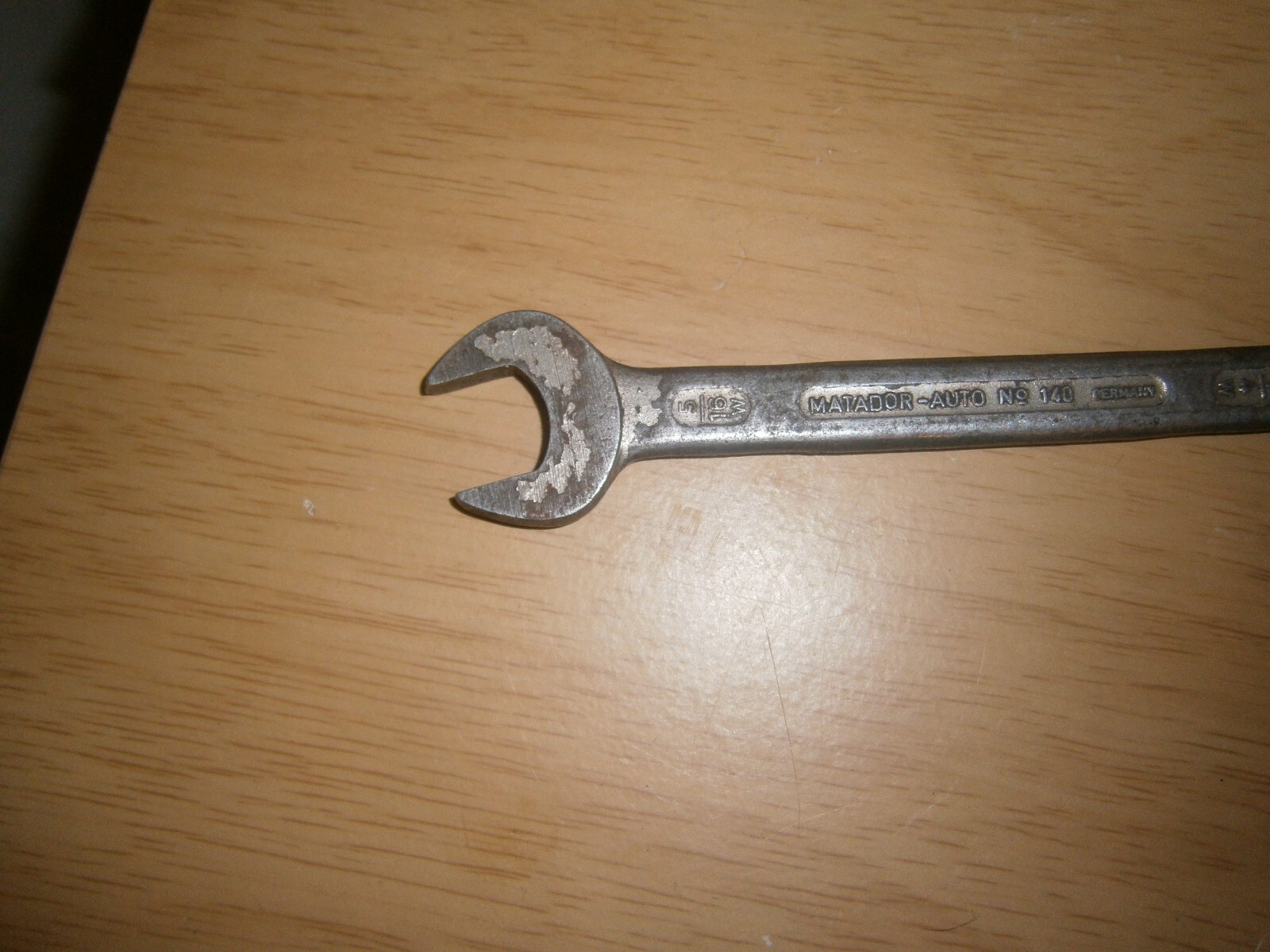 Vintage silver tone spanner. 5/16 & 1/4 W ends.(E6c)
