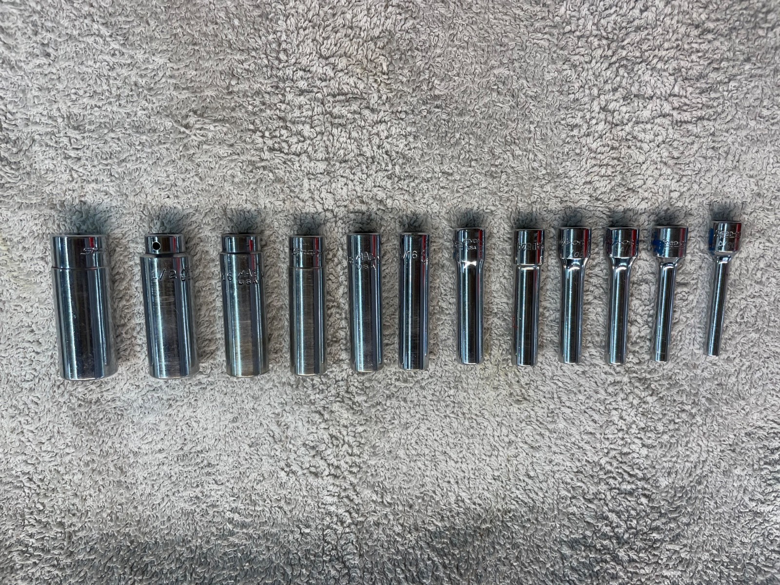 1/4″ Deep Sockets 7 Snap -On and 5 MAC. Total 12 pieces
