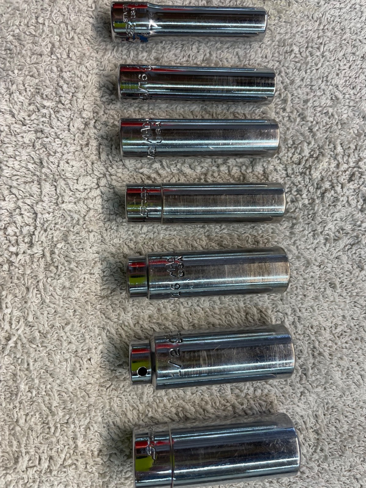 1/4″ Deep Sockets 7 Snap -On and 5 MAC. Total 12 pieces