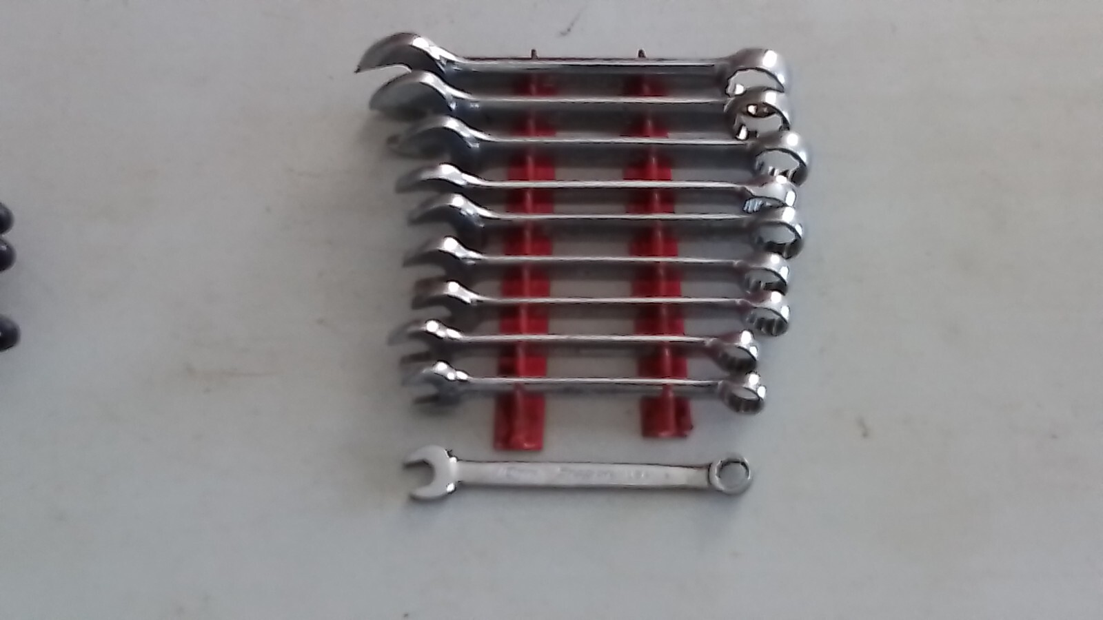 SNAP ON OEXM 10 PIECE SHORT METRIC COMBINATION WRENCH SET FROM 10MM. TO 19MM.