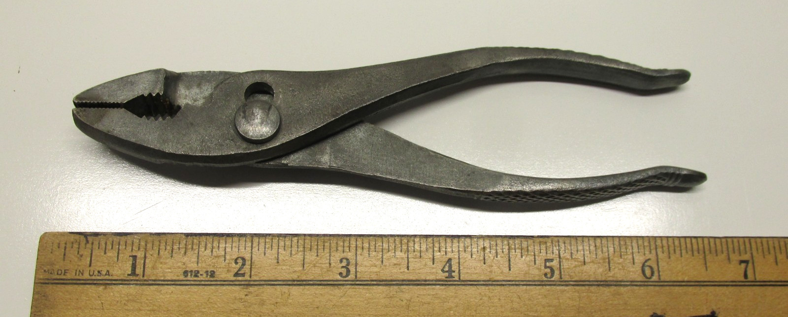 Motorcycle Slip Joint Pliers 6-1/2″ long, galvanized finish and textured grip.