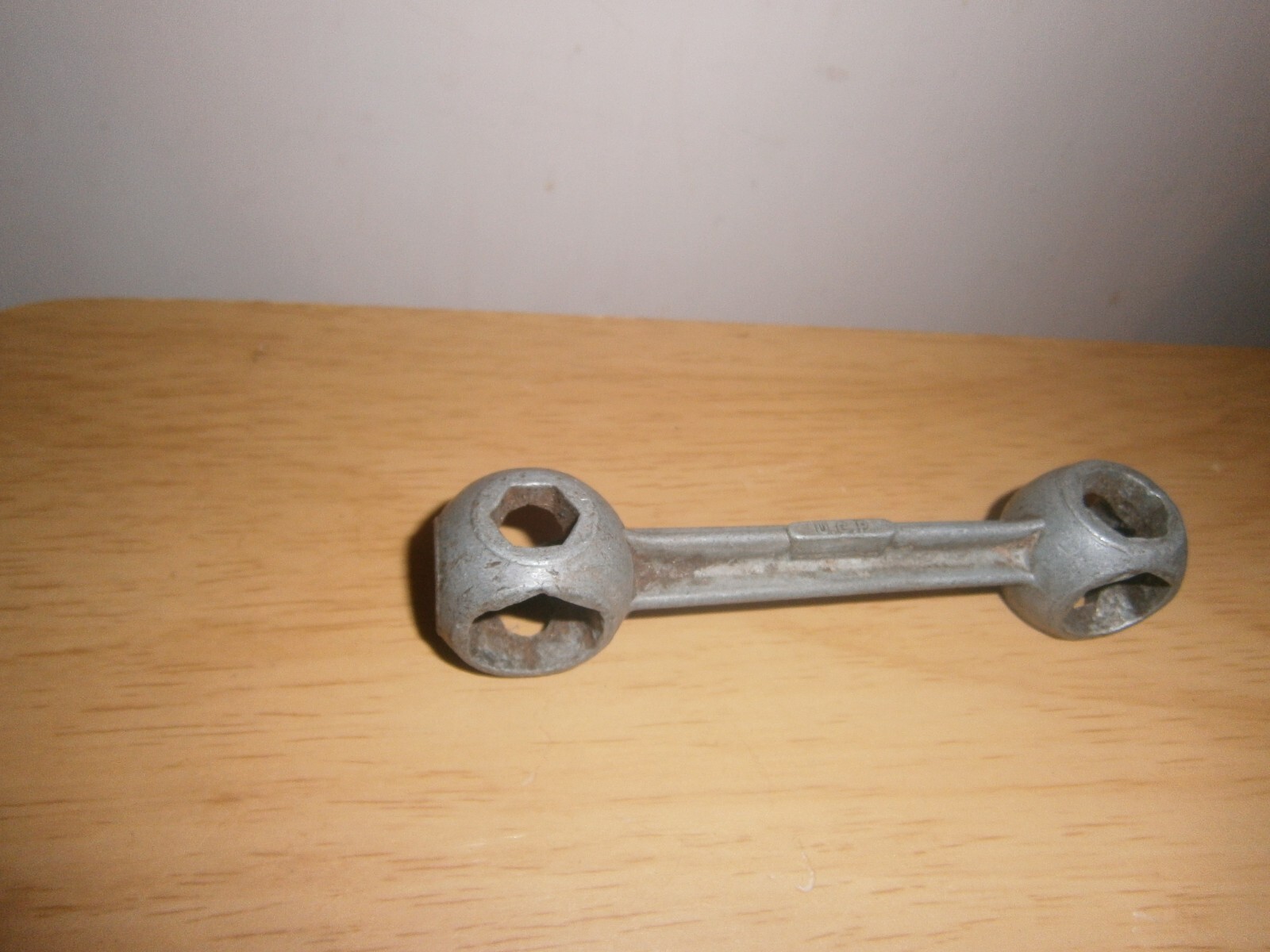 Vintage silver tone U.C.P. England multi spanner. 17mm end.(E6d)