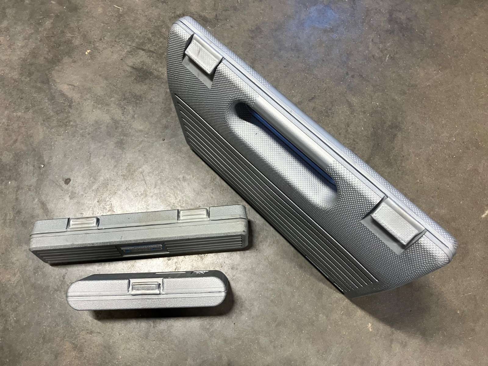 3 Empty Socket Cases, 11 pc 1/2″ drive, 9 pc 3/8″ drive, 36 pc 3/8″ & 1/2″ drive