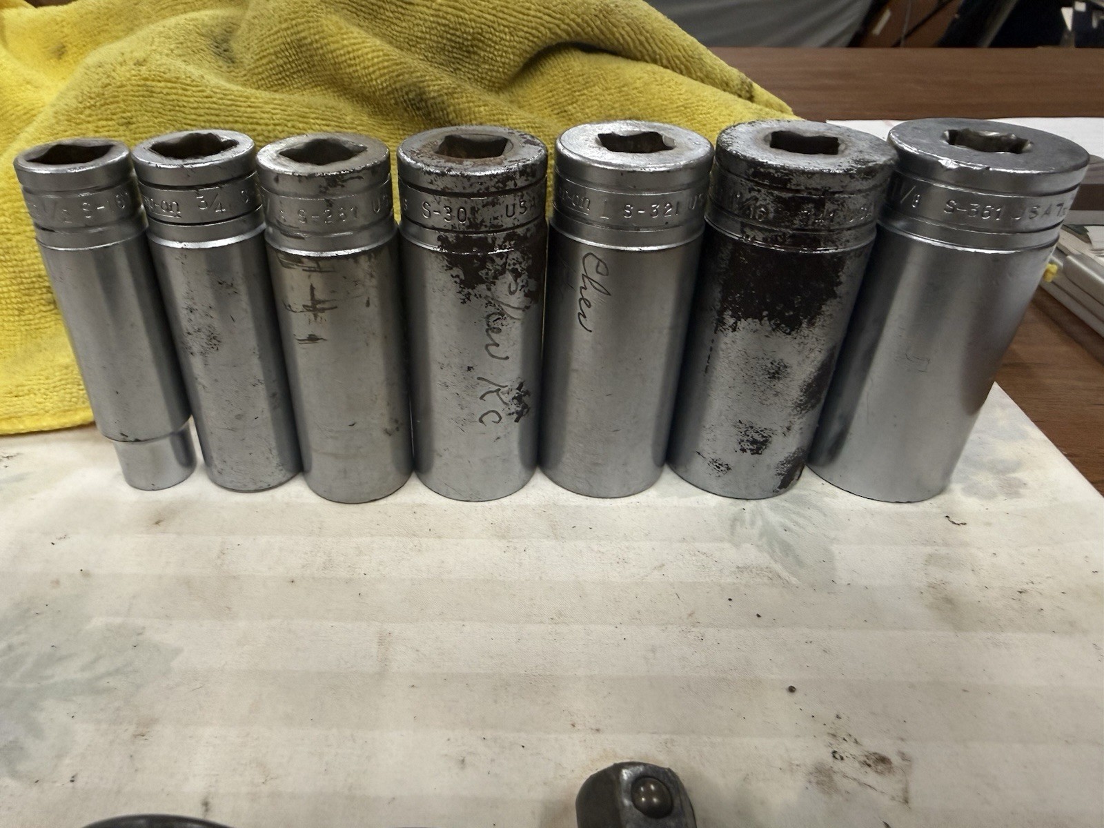 Snap On Sockets And 3/8” 11” Extension. 7—1/2” Drive Deep, 3—1/2” Drive Impact