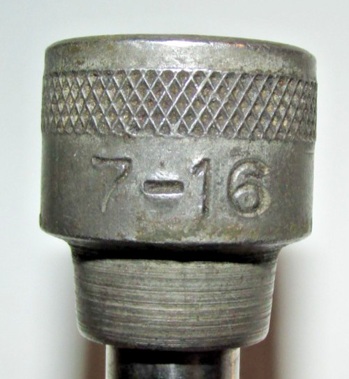 T #169 – Unbranded, 3/8 male to 1/2″ female socket adapter, Marked 7-16