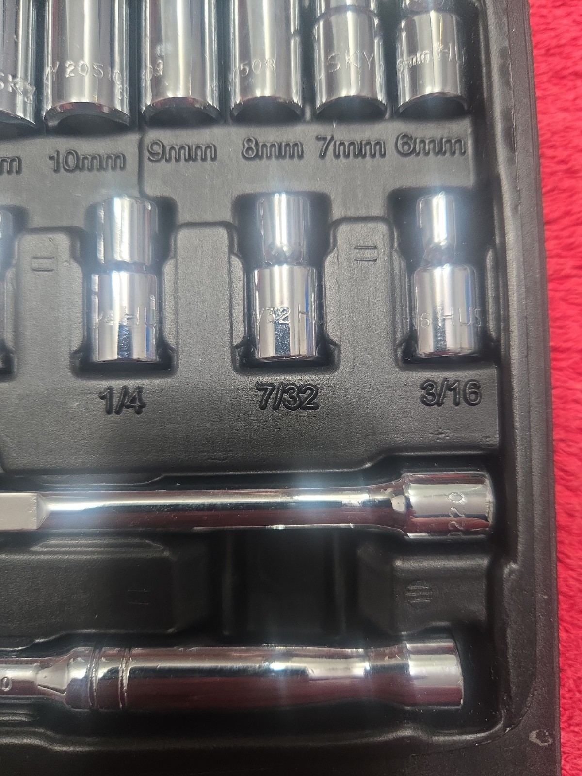 Thirty piece husky 1/4″ Dr Sae/ Metric Socket set