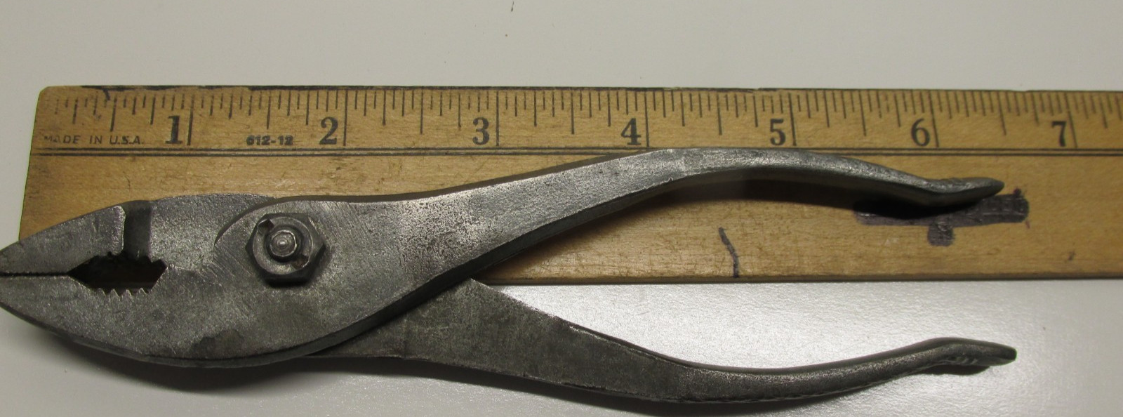Motorcycle Slip Joint Pliers 6-1/2″ long, galvanized finish and textured grip.