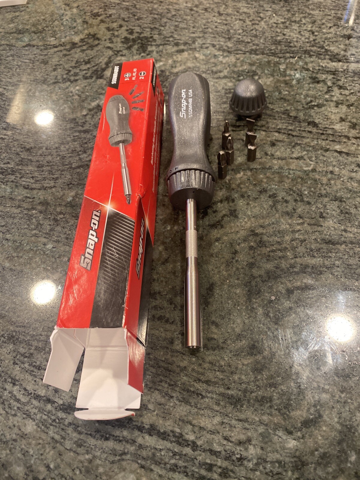 Snap On ssdmr4bdt ratcheting screwdriver with 5 bits dark titanium