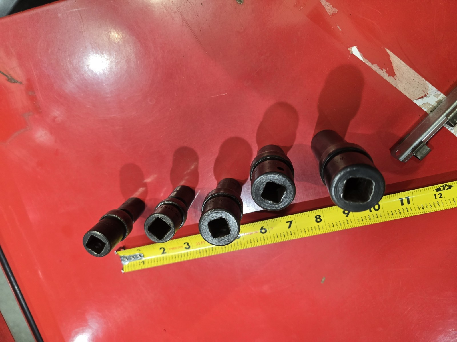 SNAP ON 1/2 DRIVE UNIVERSAL SWIVEL IMPACTS IN SAE. 4 PIECE SET WITH BONUS DEEP