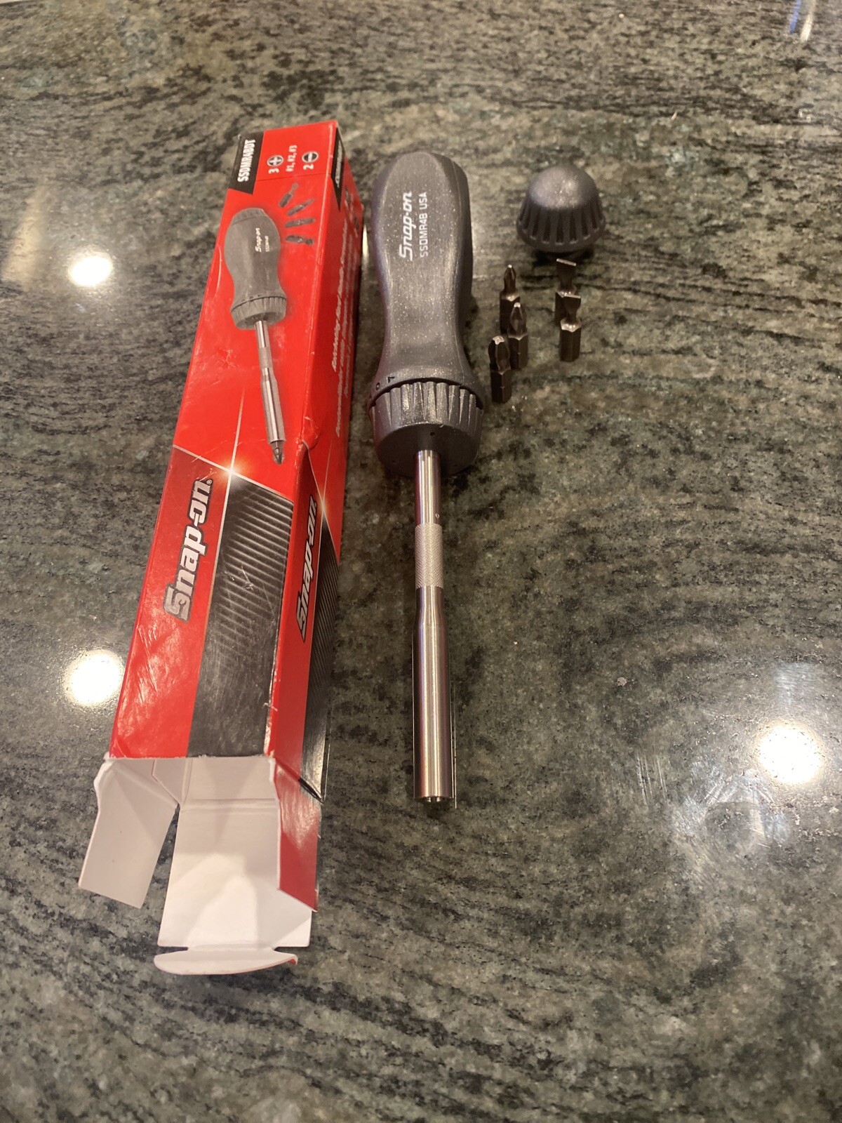 Snap On ssdmr4bdt ratcheting screwdriver with 5 bits dark titanium