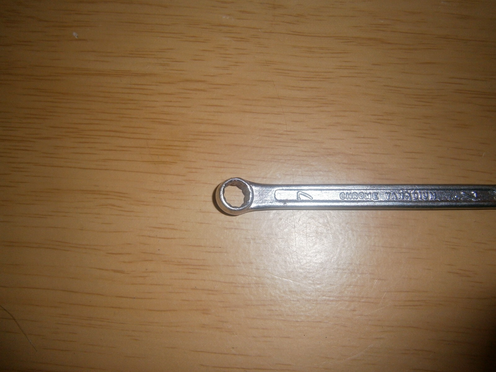 Vintage silver tone spanner. 7mm both ends.(E6c)