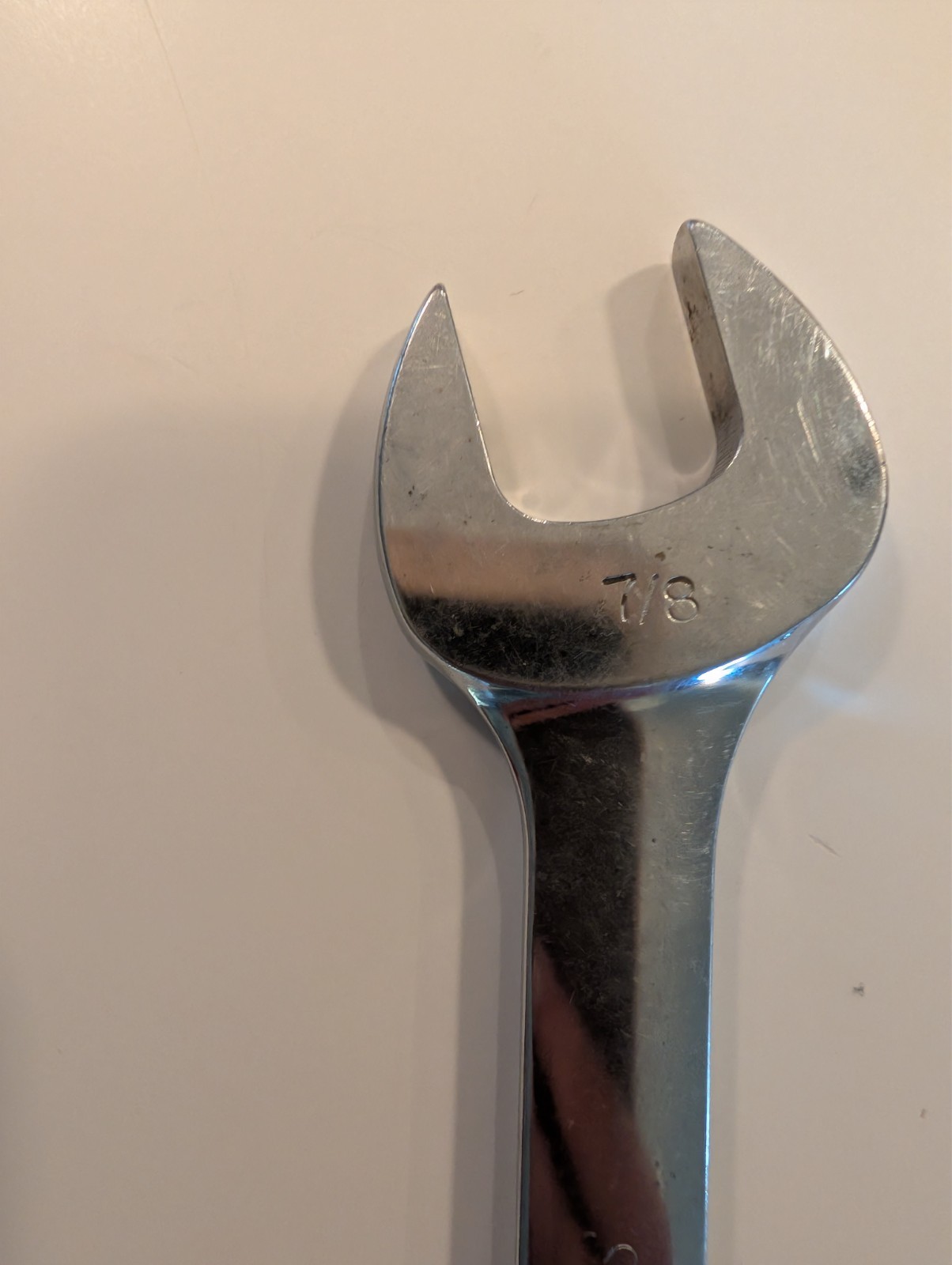 five snap-on wrenches. Four open end one swivel head. Decently well maintained
