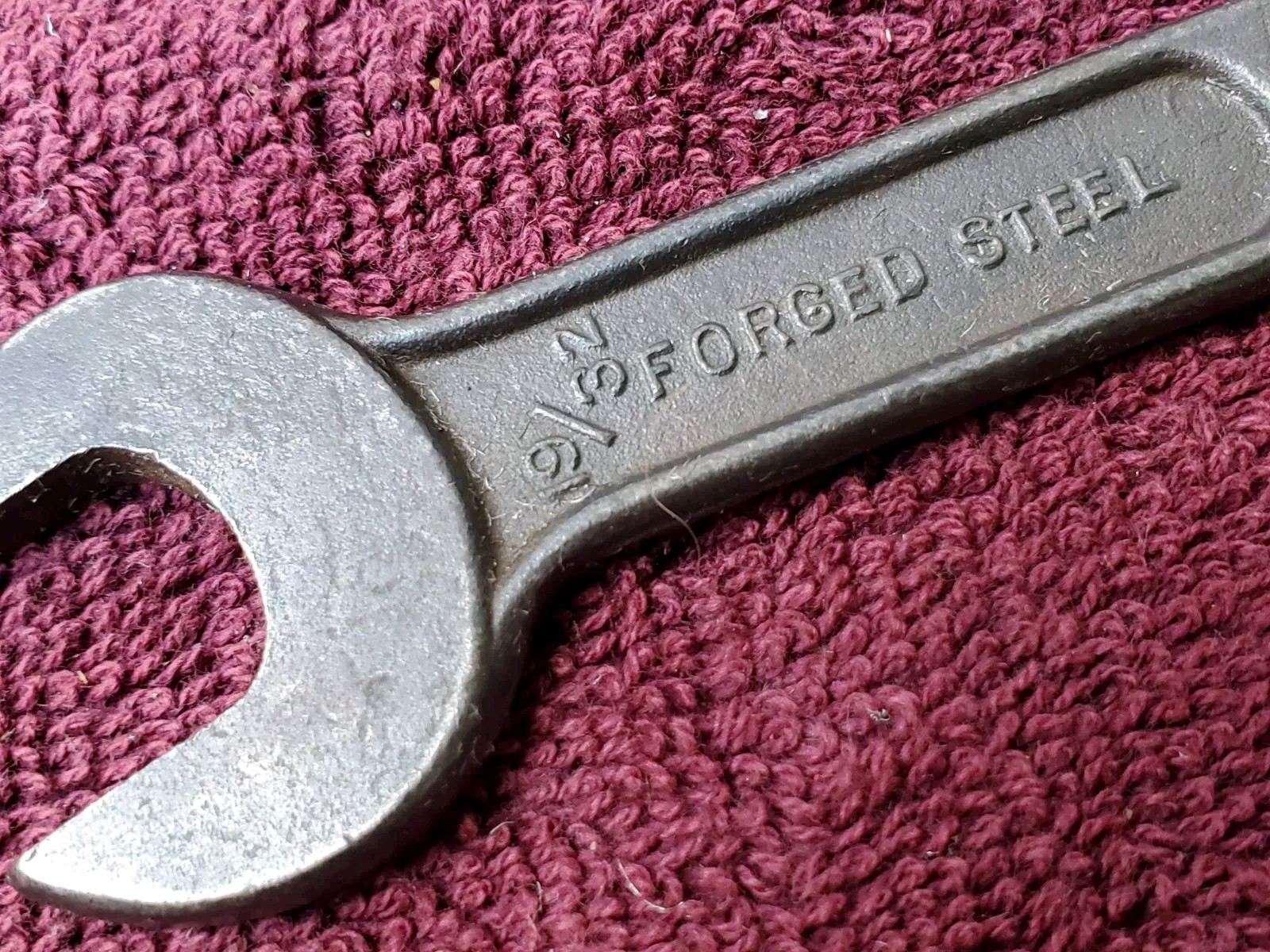 Unmarked 11/16″ by 19/32″ or 15 mm by 18 mm Open End Wrench