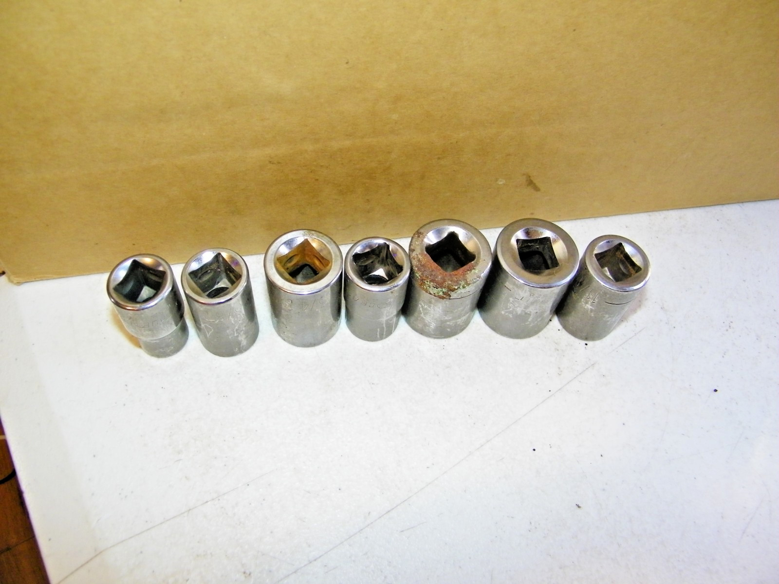 Lot Of 7 Truecraft Dr., 6 point Sockets 7/8, 13/16, 11/16, 3/4, 5/8,1/2, 9/16.