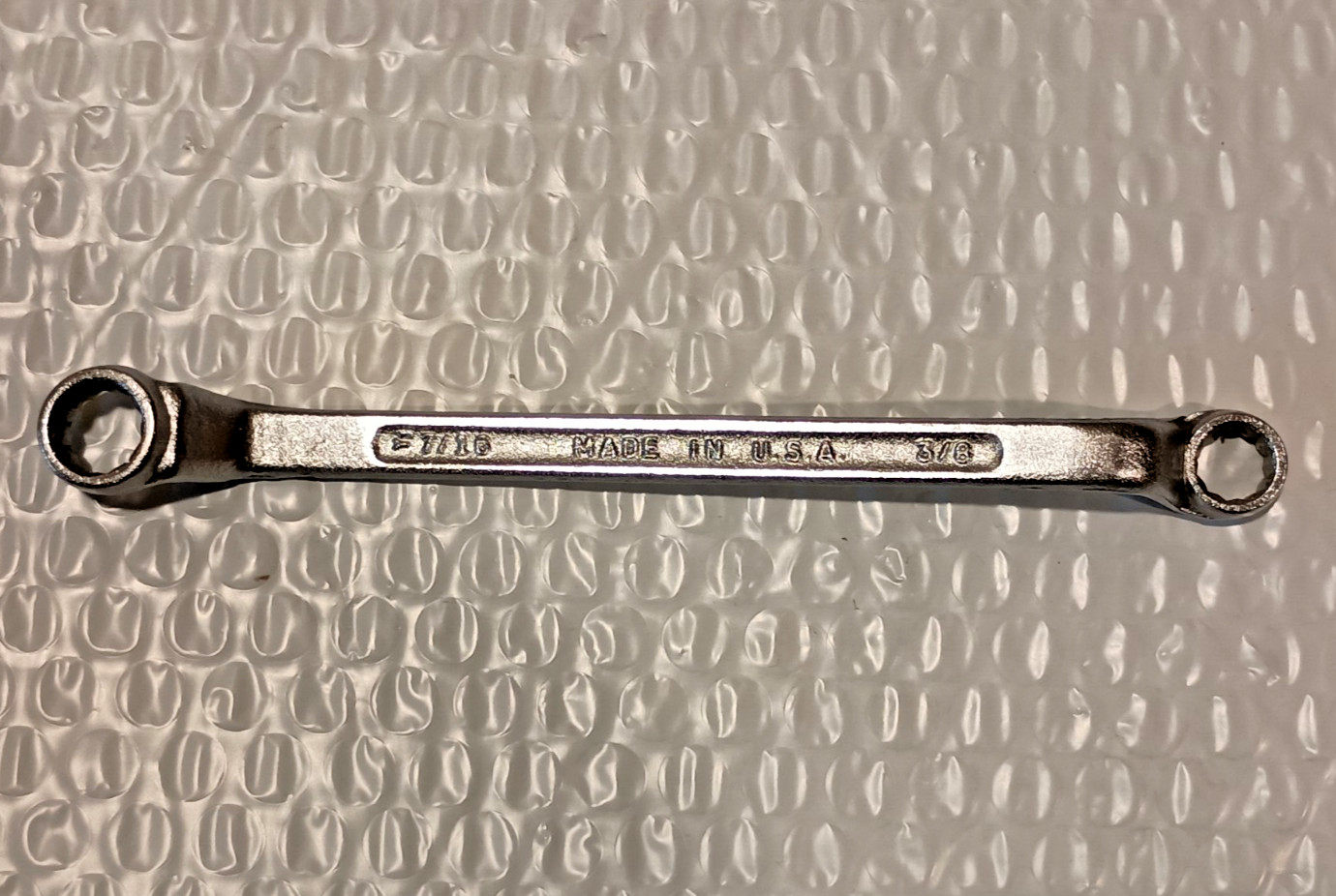 3/8 x 7/16″ DOUBLE BOX WRENCH, 6.8″ LONG, OFFSET, 12 POINT, UNBRANDED.