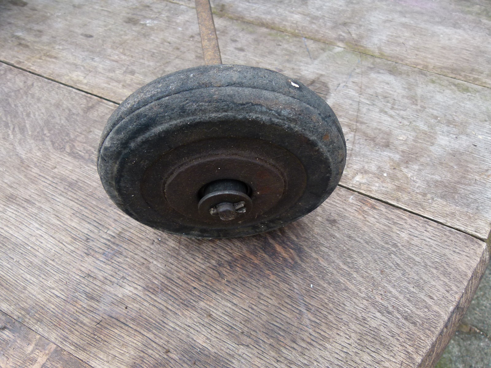 VINTAGE SOLID RUBBER WHEELS AXLES ARE 18 AND 15 INCH INSIDE WHEELS ARE 6 INCH