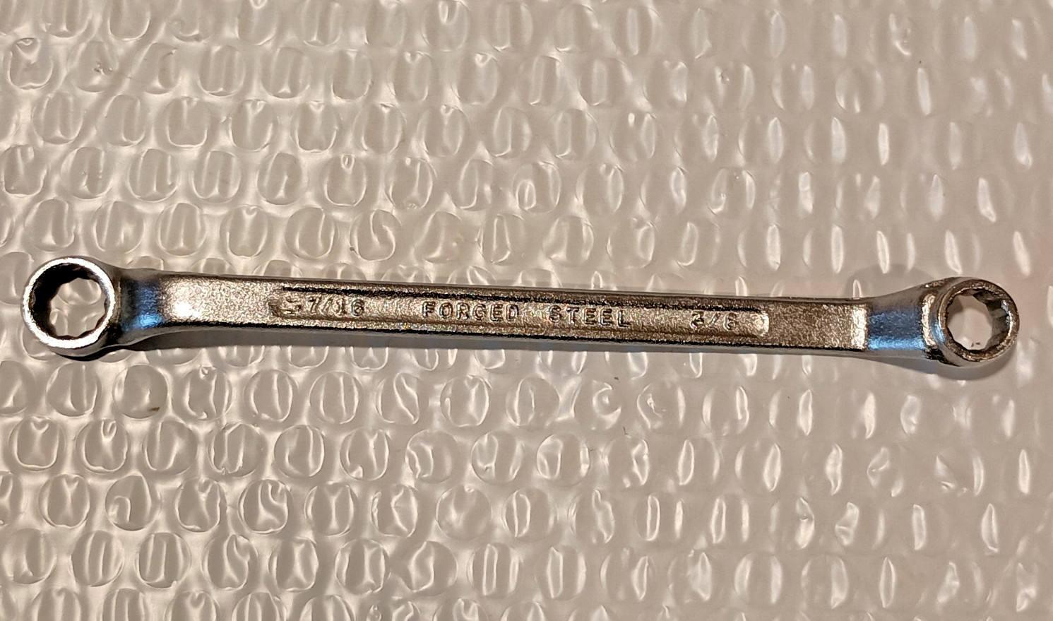 3/8 x 7/16″ DOUBLE BOX WRENCH, 6.8″ LONG, OFFSET, 12 POINT, UNBRANDED.