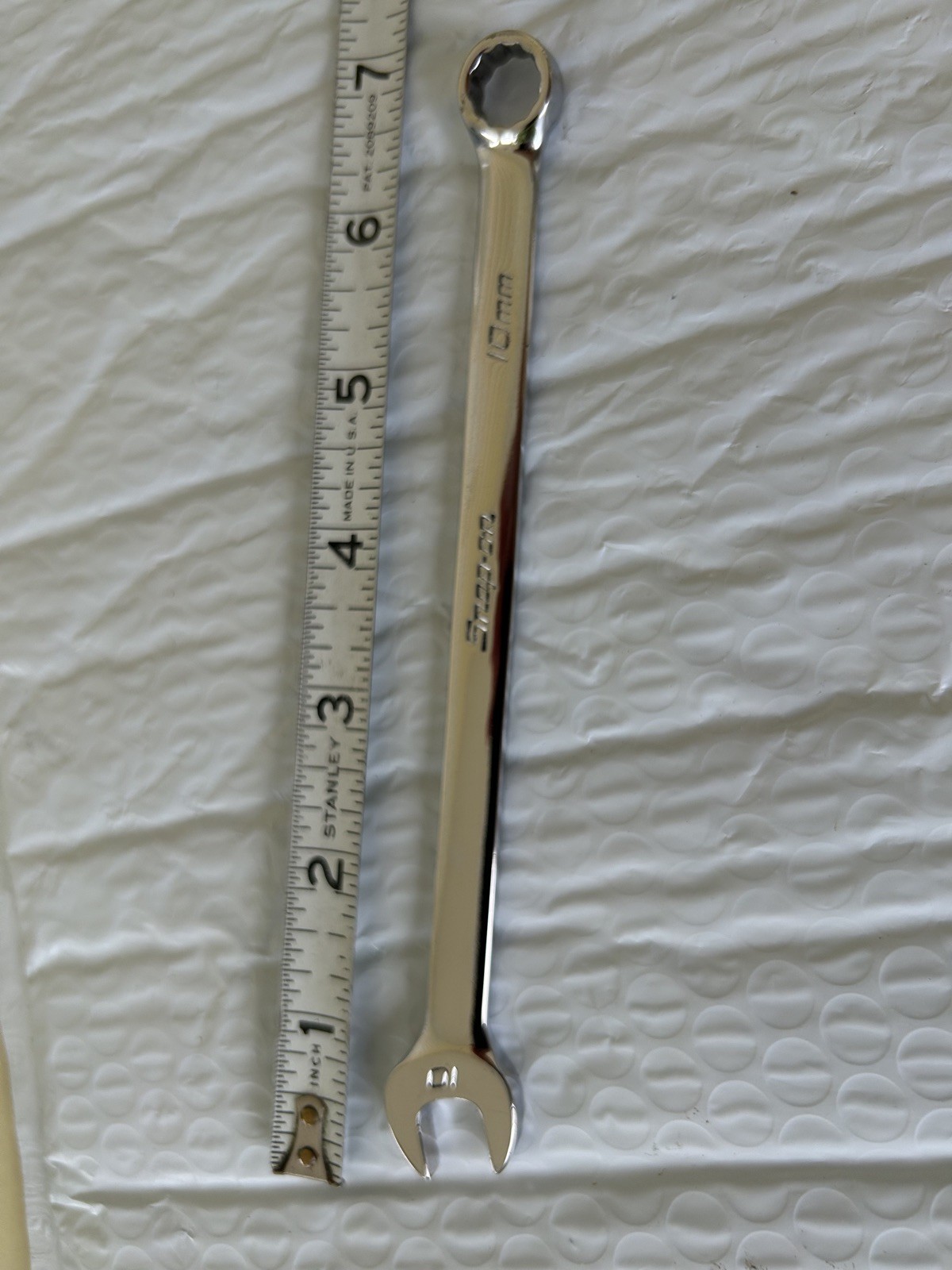 Snap On USA 10 mm VINTAGE 12 pt LONG combination wrench. OEXM100A