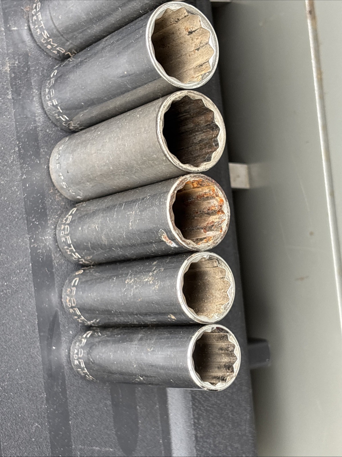 Craftsman Mixed Lot of (8) 12-point SAE deep sockets with a 1/2-inch drive.