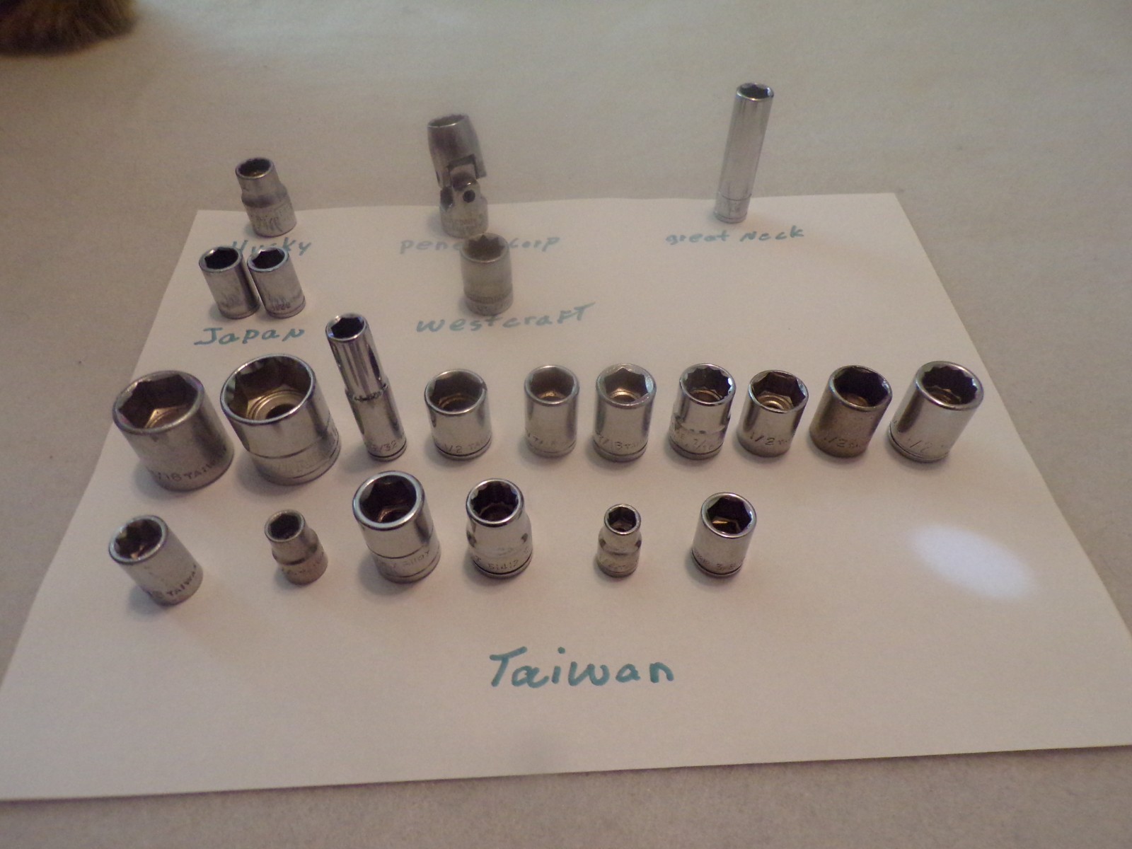 Lot of 22 assorted standard sockets. There are some 6 point and 12 point