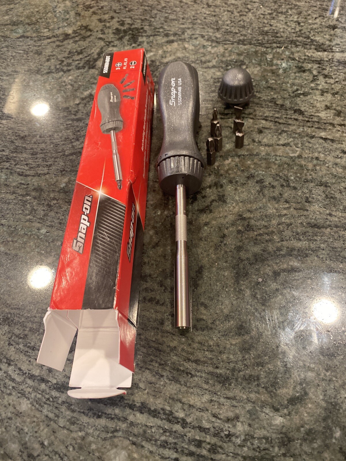 Snap On ssdmr4bdt ratcheting screwdriver with 5 bits dark titanium